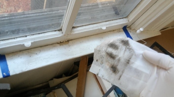 Lead dust on a window sill where dust wipe sampling may be performed